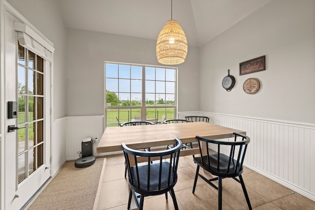 11404 Grapeleaf Dr, Fort Worth, TX 76244 - tiled dining room featuring wainscoting and vaulted ceiling