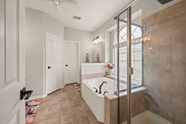 11404 Grapeleaf Dr, Fort Worth, TX 76244 - full bathroom with a shower stall, a bath, a ceiling fan, and baseboards