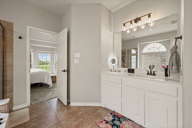 11404 Grapeleaf Dr, Fort Worth, TX 76244 - ensuite bathroom with a shower stall, vanity, baseboards, and tile patterned floors