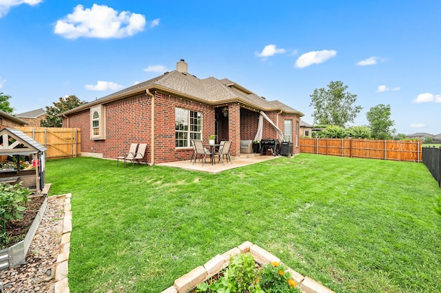 11404 Grapeleaf Dr, Fort Worth, TX 76244 - rear view of property with a chimney, brick siding, a patio, and a shingled roof