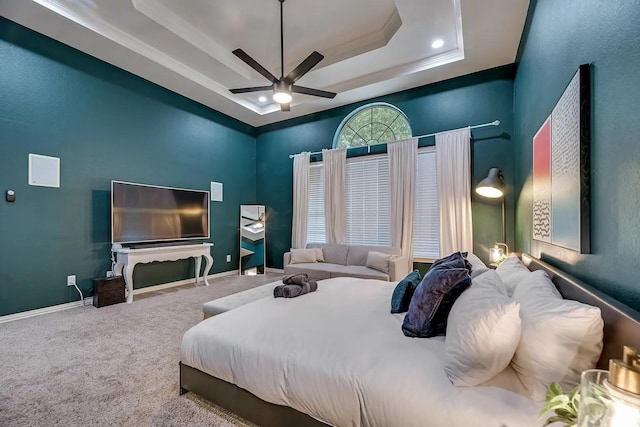 1529 Arrowhead Ln, Carrollton, TX 75007 - carpeted bedroom featuring a raised ceiling, crown molding, ceiling fan, and baseboards