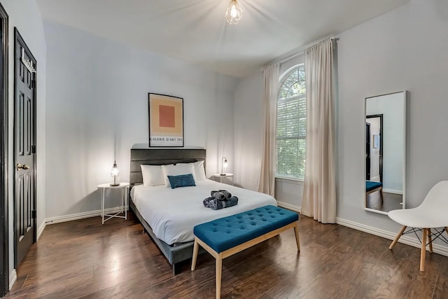 1529 Arrowhead Ln, Carrollton, TX 75007 - bedroom featuring multiple windows, wood finished floors, and baseboards
