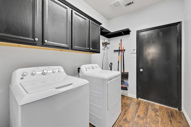 1529 Arrowhead Ln, Carrollton, TX 75007 - laundry room featuring cabinet space, independent washer and dryer, dark wood finished floors, and baseboards