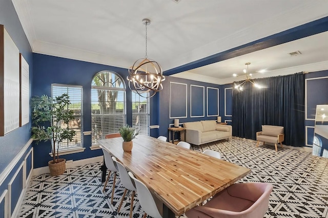 1529 Arrowhead Ln, Carrollton, TX 75007 - dining space with a chandelier, a decorative wall, and crown molding