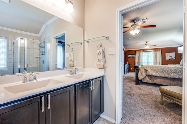 5710 Salisbury Dr, Prosper, TX 75078 - ensuite bathroom featuring ornamental molding, a stall shower, double vanity, and a ceiling fan