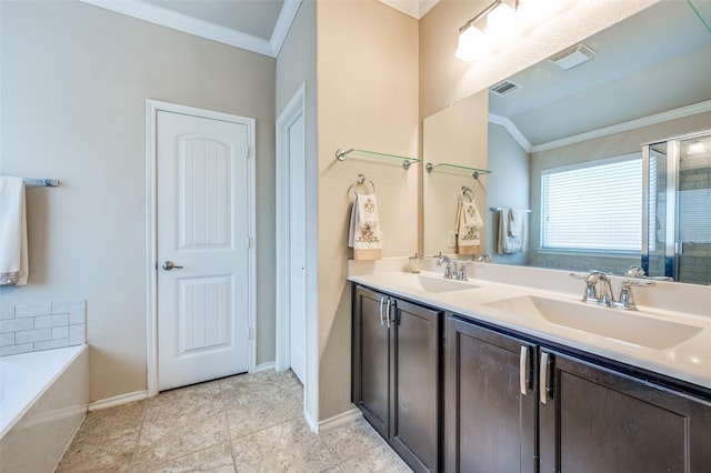 5710 Salisbury Dr, Prosper, TX 75078 - bathroom featuring ornamental molding, double vanity, a bath, baseboards, and tile patterned floors