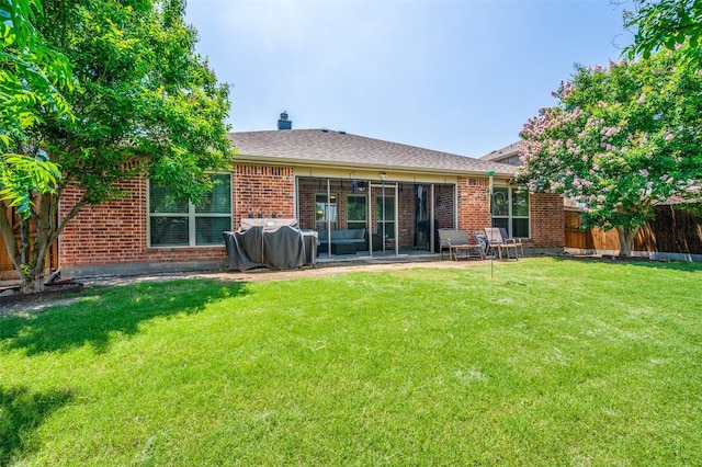 5710 Salisbury Dr, Prosper, TX 75078 - back of property featuring brick siding, a patio, and a chimney