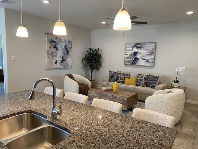 1037 Madelia Ave, Fort Worth, TX 76177 - living room featuring recessed lighting, baseboards, tile patterned flooring, and a ceiling fan