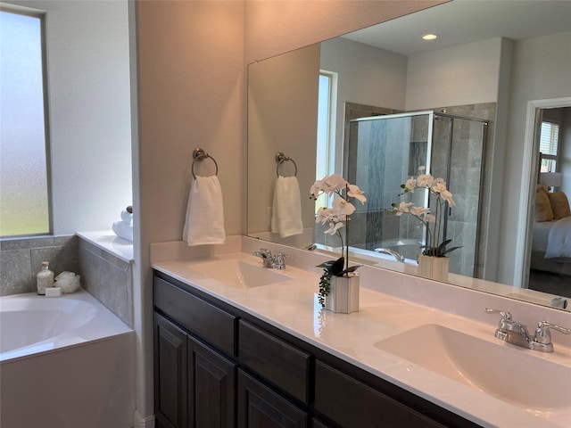 1037 Madelia Ave, Fort Worth, TX 76177 - ensuite bathroom featuring a garden tub, a shower stall, and double vanity