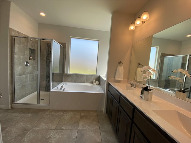 1037 Madelia Ave, Fort Worth, TX 76177 - bathroom featuring healthy amount of natural light, a garden tub, double vanity, and a stall shower