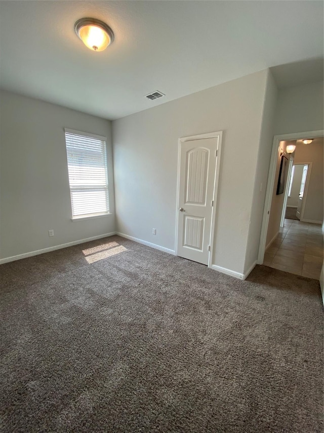 1037 Madelia Ave, Fort Worth, TX 76177 - carpeted empty room featuring baseboards