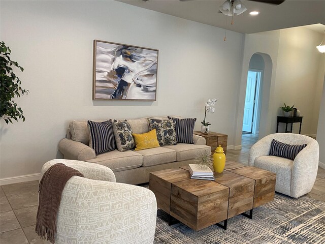 1037 Madelia Ave, Fort Worth, TX 76177 - living room with arched walkways, baseboards, and ceiling fan