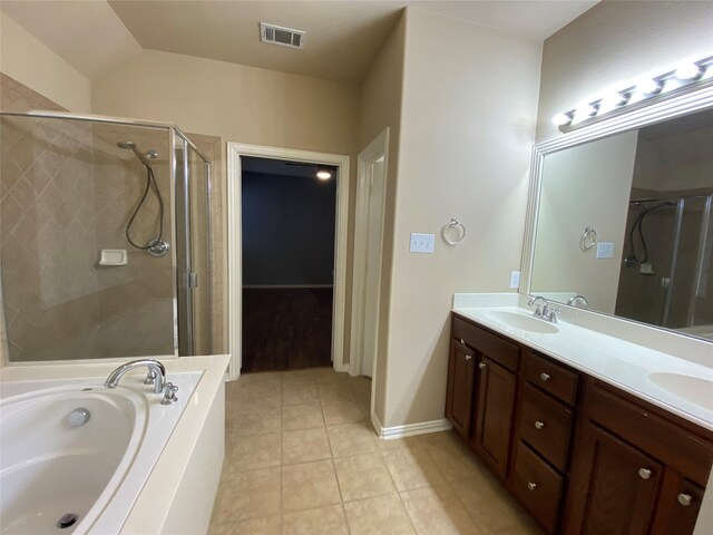 1705 Spanish Moss Way, Savannah, TX 76227 - bathroom with a stall shower, double vanity, a garden tub, and tile patterned floors
