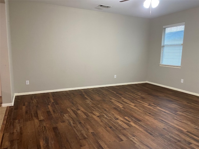 1705 Spanish Moss Way, Savannah, TX 76227 - unfurnished room featuring a ceiling fan, dark wood-style floors, and baseboards