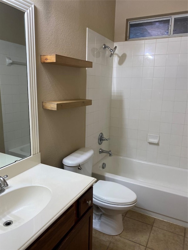 1705 Spanish Moss Way, Savannah, TX 76227 - full bath with a textured wall, vanity, bathtub / shower combination, toilet, and tile patterned flooring