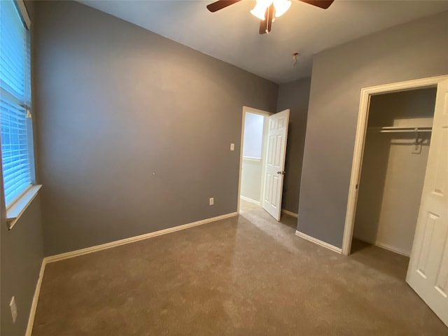 1705 Spanish Moss Way, Savannah, TX 76227 - unfurnished bedroom featuring carpet floors, a closet, baseboards, and a ceiling fan