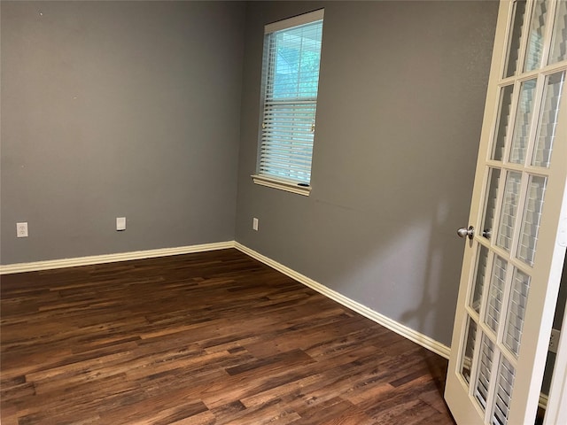 1705 Spanish Moss Way, Savannah, TX 76227 - empty room featuring dark wood-type flooring and baseboards