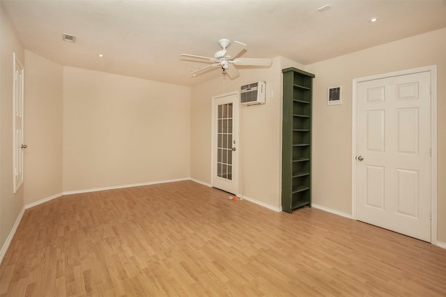 4512 Blue Jay Ln, Sherman, TX 75092 - spare room with light wood finished floors, ceiling fan, and baseboards