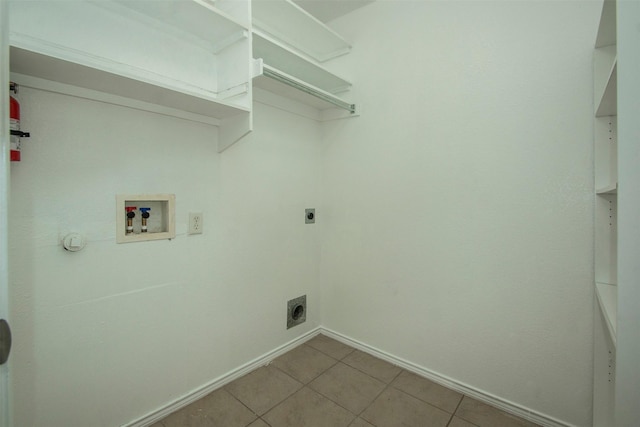 4512 Blue Jay Ln, Sherman, TX 75092 - laundry room featuring hookup for an electric dryer, washer hookup, baseboards, and light tile patterned floors