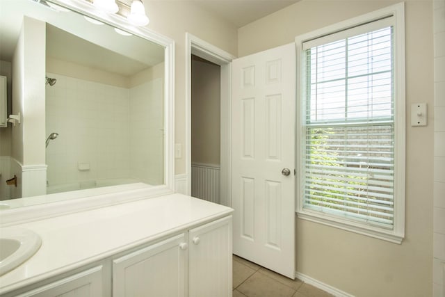 4512 Blue Jay Ln, Sherman, TX 75092 - bathroom featuring vanity, tile patterned floors, healthy amount of natural light, and bathtub / shower combination