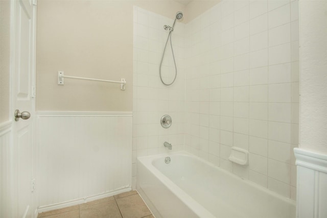 4512 Blue Jay Ln, Sherman, TX 75092 - full bathroom with tile patterned floors, washtub / shower combination, and a wainscoted wall