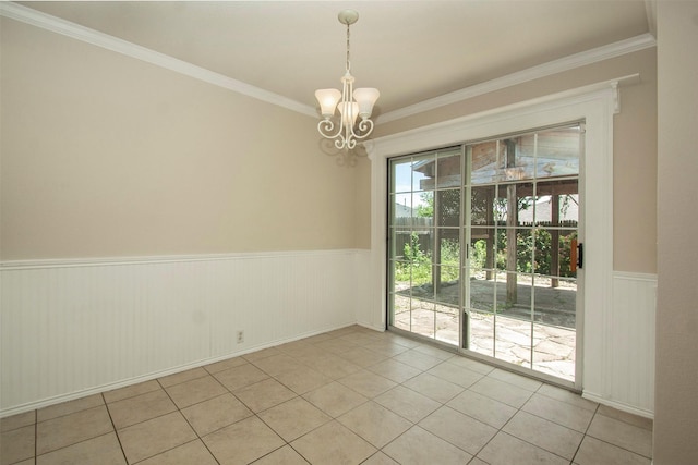 4512 Blue Jay Ln, Sherman, TX 75092 - spare room with a chandelier, light tile patterned flooring, a wainscoted wall, and ornamental molding