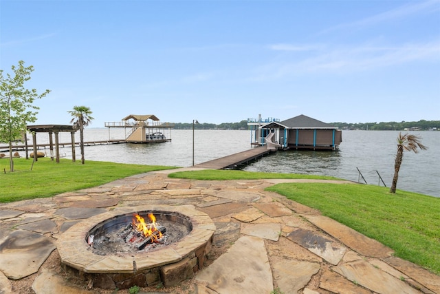 18280 Red Oak Dr, Mabank, TX 75156 - dock area with an outdoor fire pit, boat lift, a yard, and a water view