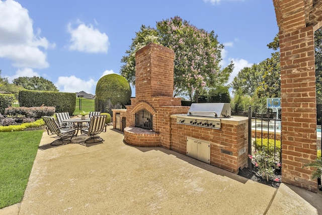 1516 Byron Nelson Pkwy, Southlake, TX 76092 - view of patio with an outdoor brick fireplace