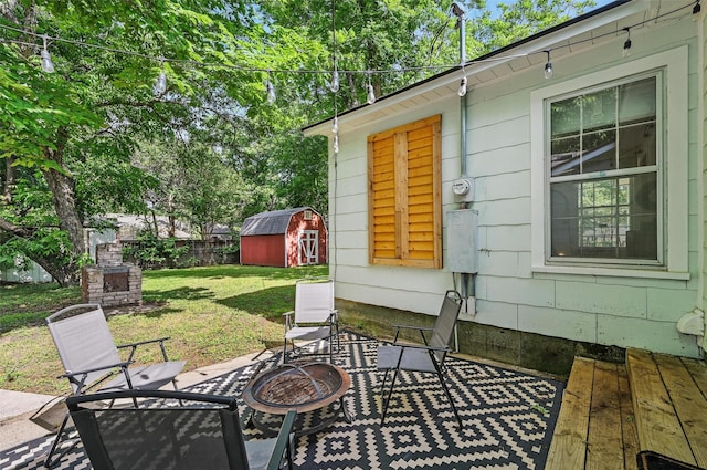 916 Carondolet Ct, River Oaks, TX 76114 - view of patio / terrace with an outdoor fire pit
