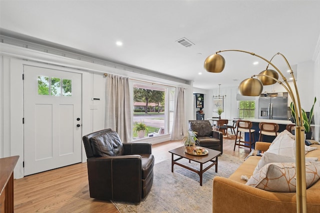 916 Carondolet Ct, River Oaks, TX 76114 - living area featuring light wood finished floors and recessed lighting