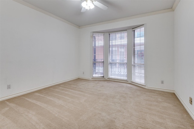 3208 Cole Ave Unit 2205, Dallas, TX 75204 - empty room with crown molding, carpet flooring, ceiling fan, and baseboards