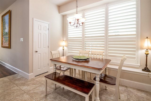 2636 Deer Hollow Dr, Little Elm, TX 75068 - dining room featuring a chandelier, baseboards, and tile patterned floors
