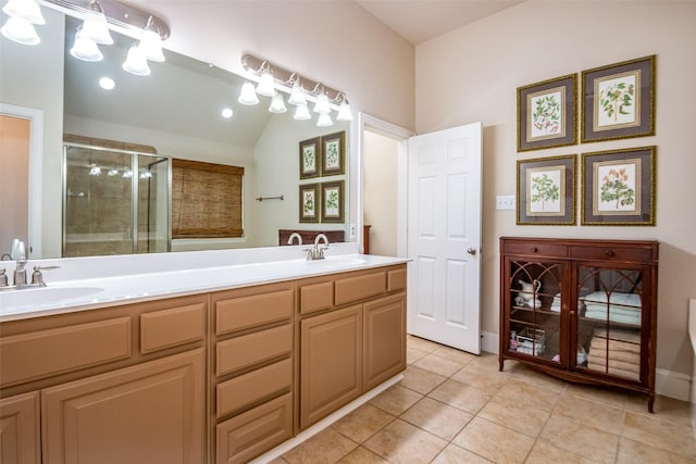 2636 Deer Hollow Dr, Little Elm, TX 75068 - full bathroom with a stall shower, double vanity, tile patterned flooring, and lofted ceiling