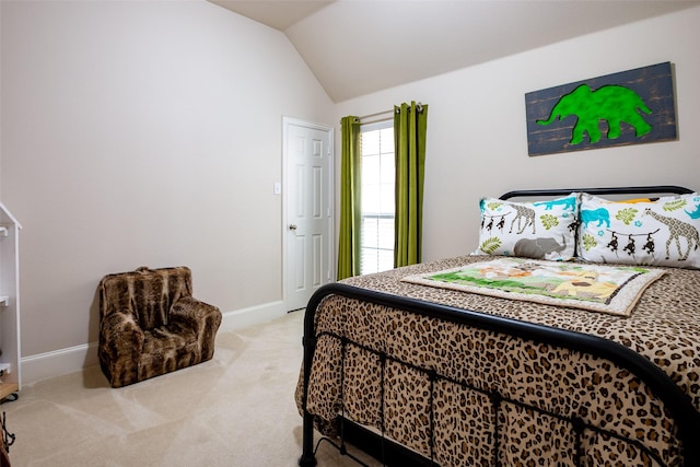2636 Deer Hollow Dr, Little Elm, TX 75068 - bedroom featuring light colored carpet, lofted ceiling, and baseboards