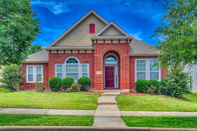 6939 Truth Dr, Dallas, TX 75236 - view of front of property featuring brick siding, a front yard, and roof with shingles