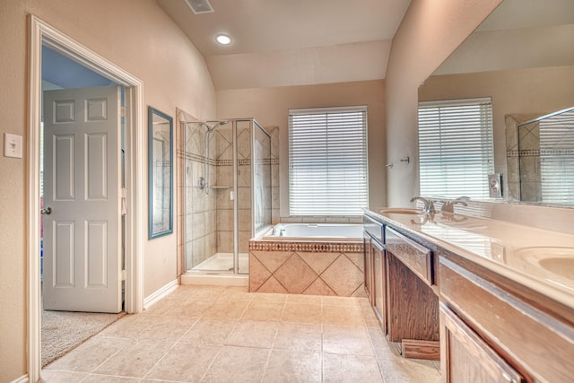 6939 Truth Dr, Dallas, TX 75236 - full bathroom featuring tile patterned floors, a garden tub, a shower stall, double vanity, and lofted ceiling
