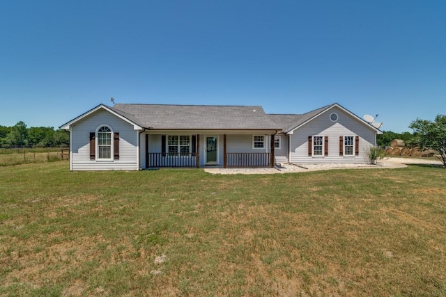 1759 County Road 2712, Caddo Mills, TX 75135 - back of property with a porch and a lawn