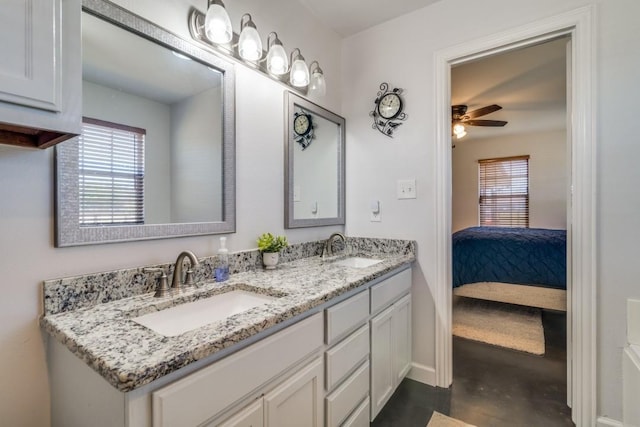 1759 County Road 2712, Caddo Mills, TX 75135 - ensuite bathroom featuring double vanity, plenty of natural light, concrete flooring, and ceiling fan