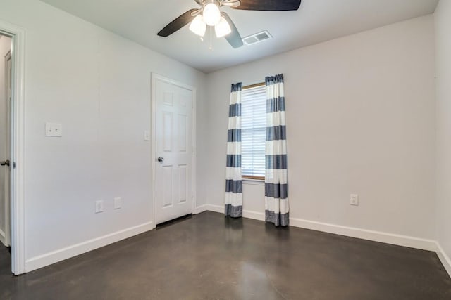 1759 County Road 2712, Caddo Mills, TX 75135 - spare room with baseboards, concrete floors, and a ceiling fan