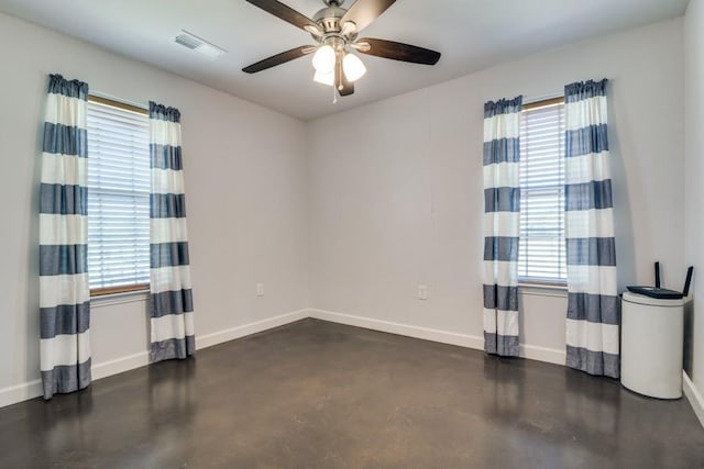 1759 County Road 2712, Caddo Mills, TX 75135 - empty room featuring baseboards, finished concrete floors, and a ceiling fan