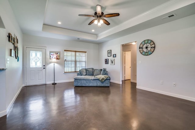 1759 County Road 2712, Caddo Mills, TX 75135 - living area with a tray ceiling, ornamental molding, ceiling fan, concrete floors, and baseboards
