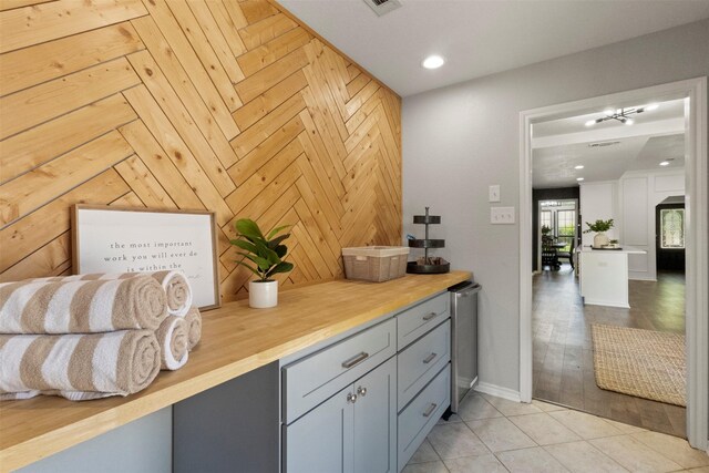 517 Sunset Dr, Hurst, TX 76054 - bar featuring baseboards, recessed lighting, and light tile patterned floors