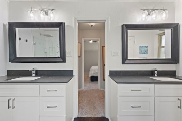 517 Sunset Dr, Hurst, TX 76054 - ensuite bathroom featuring two vanities and a shower