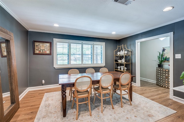 1913 Windlea Dr, Euless, TX 76040 - dining space with ornamental molding, light wood-style flooring, baseboards, and recessed lighting