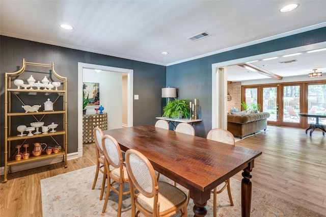 1913 Windlea Dr, Euless, TX 76040 - dining room with light wood-style floors, ornamental molding, and recessed lighting