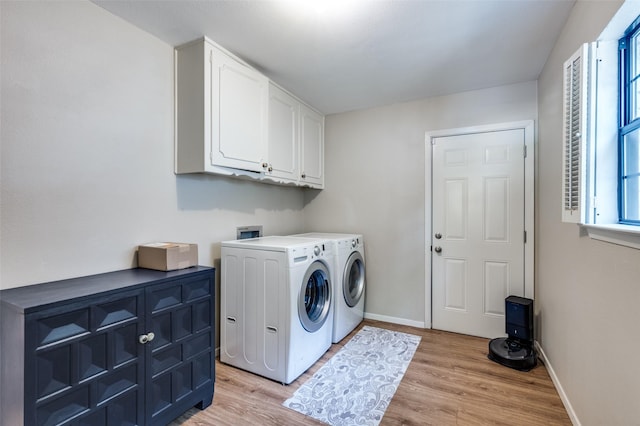 1913 Windlea Dr, Euless, TX 76040 - washroom with cabinet space, independent washer and dryer, light wood-type flooring, and baseboards