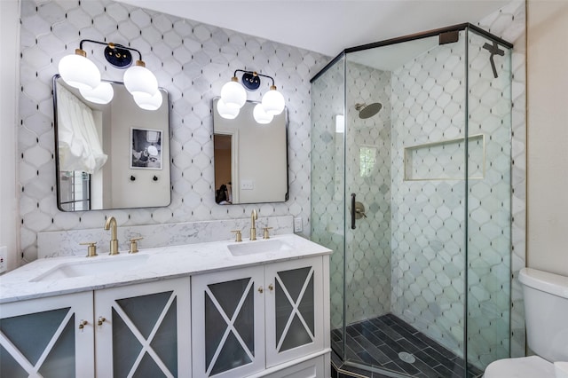 1913 Windlea Dr, Euless, TX 76040 - full bathroom featuring double vanity, a shower stall, and toilet