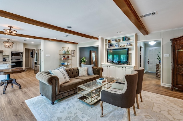 1913 Windlea Dr, Euless, TX 76040 - living area featuring beamed ceiling, light wood finished floors, ornamental molding, recessed lighting, and a chandelier