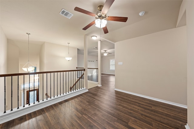 5505 Wisdom Ct, Waco, TX 76708 - spare room with ceiling fan, dark wood-style floors, baseboards, a smoke detector, and vaulted ceiling