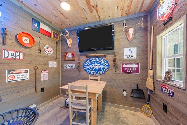 5505 Wisdom Ct, Waco, TX 76708 - recreation room with wood walls and unfinished concrete floors